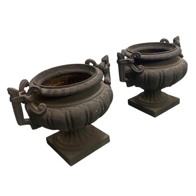 Add a touch of timeless, old-world elegance to your garden, patio, or home entryway with this striking pair of vintage...
