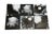 Set of four black and white acrylic and ink paintings on canvas, each measuring 8" by 8". Created by artist Yvonne Jean...