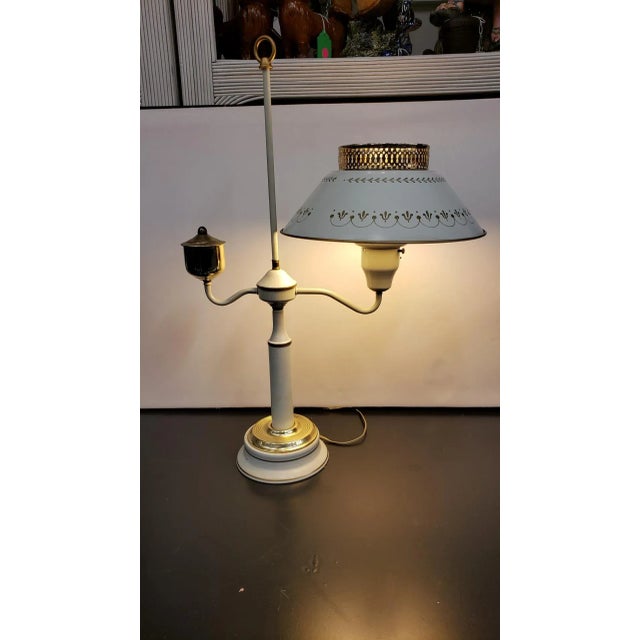 This beautiful vintage lamp is designed to resemble an old gas lamp. It is in working order and in good vintage condition....