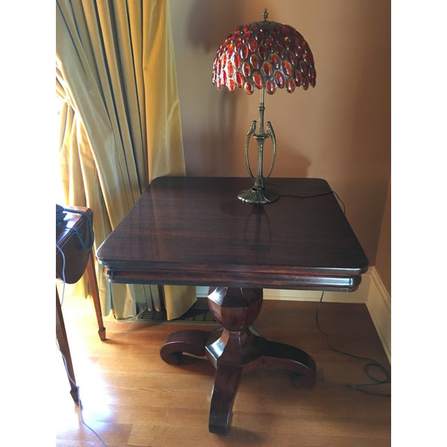 This is an American Empire side table circa 1890. It is mahogany with a beautiful french polish finish and is in excellent...