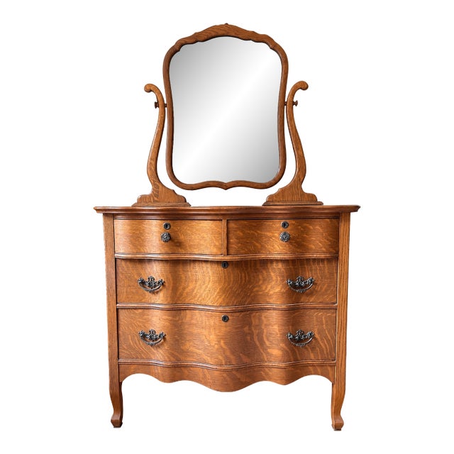 Antique 1900’s Atlas Furniture Co. Tiger Oak Serpentine Dresser With Tilting Beveled Mirror and Bail Pull Handles For Sale
