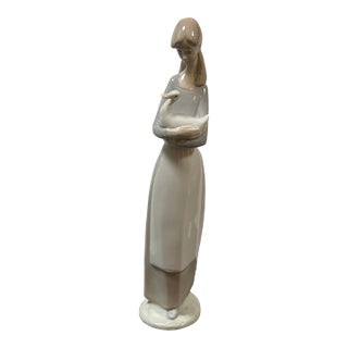 Nao for Lladró Girl in Apron Holding Duck Porcelain Figurine, Signed For Sale