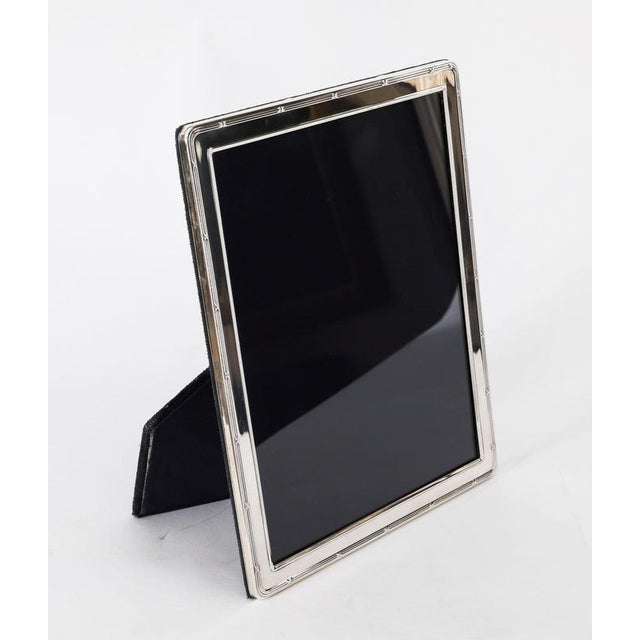 A truly superb large pair of vintage Neoclassical sterling silver photo frames, by the renowned silversmith, Arthur Price...