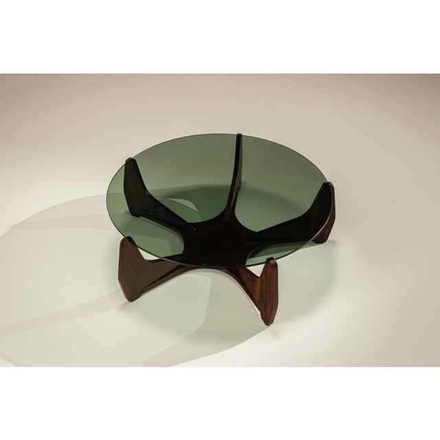 There is a quiet confidence to this coffee table, where sculptural form and material presence come together with...