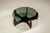 There is a quiet confidence to this coffee table, where sculptural form and material presence come together with...