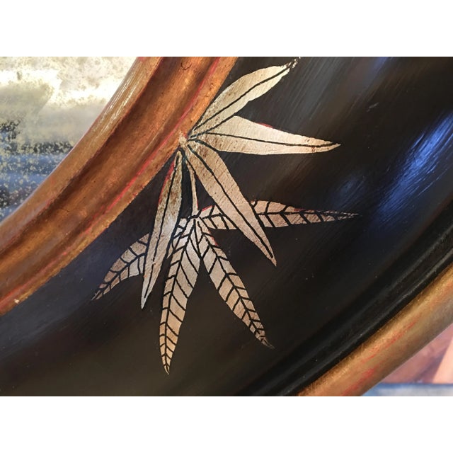 Chinoiserie Gold Bamboo Leaves on Convex Black Frame With Antiqued Oval Smoky Mirror For Sale - Image 4 of 9