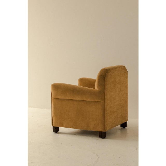 Art deco lounge chair produced in Belgium around 1940. Reupholstered in a deep yellow fabric. In good condition with some...