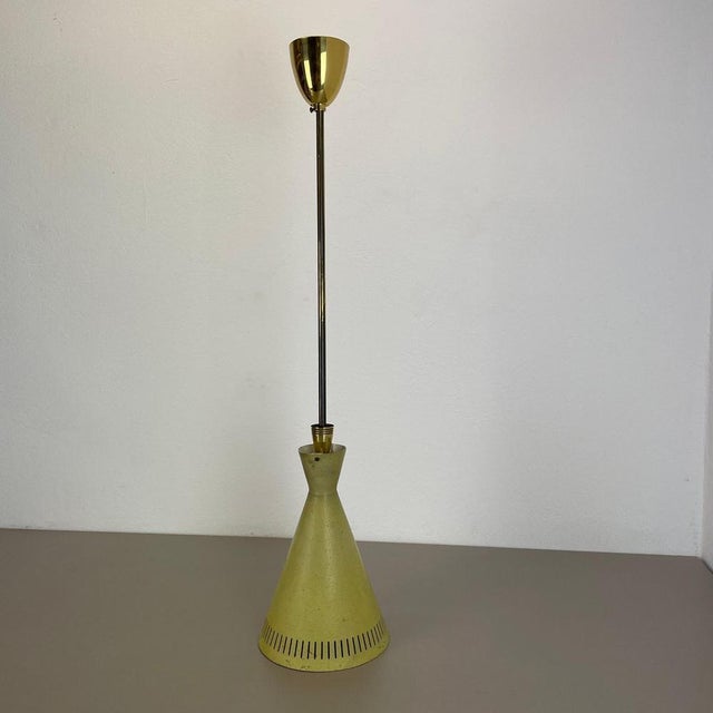 Article: diabolo Hanging light Origin: Italy Age: 1950s This fantastic hanging light was designed and produced in 1950s in...