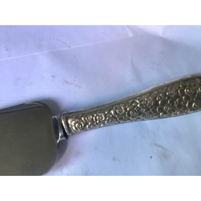Vintage Hunt Silver Co. (Sheffield, England) repousse cake server. This server is floral repousse with a sterling silver...