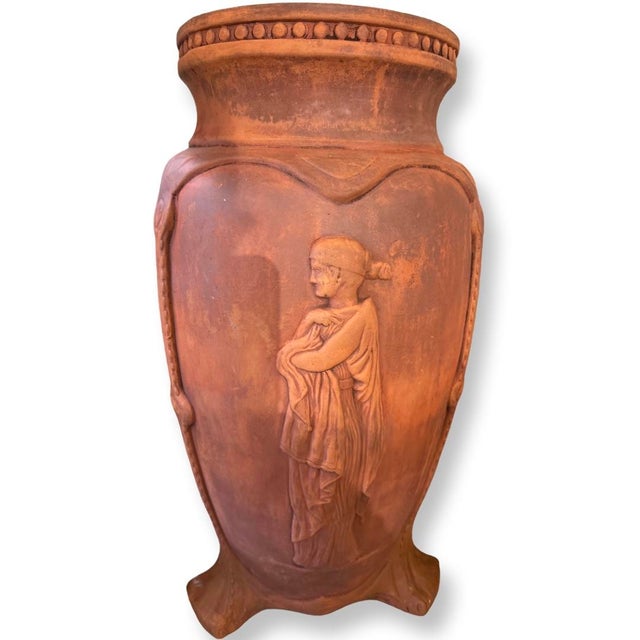 Antique Italian Terra cotta Pot with design of 3 different personage around . Base 13" by 13" top 9.5 “ diameter.