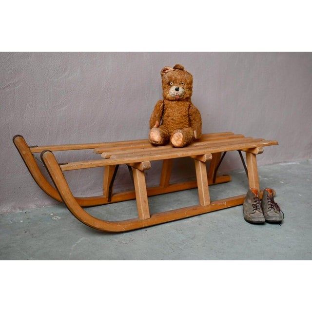Here's a sled that will bring back memories for some! This charming vintage sled, made of wood and metal, will be...