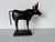 This striking vintage handmade Brutalist bull sculpture is a bold representation of mid-century modern artistry. Crafted...