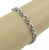 This elegant bracelet is crafted from 18k white gold with a high polished finish, it features chasing heart links with...