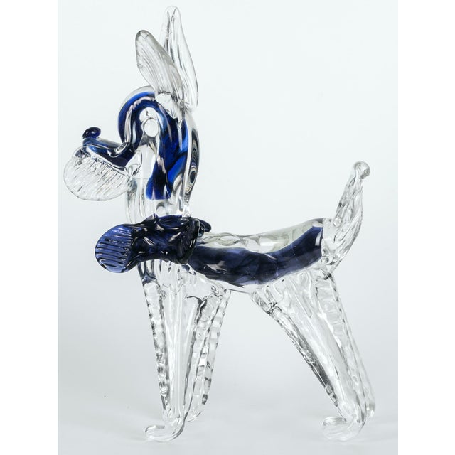 Murano glass dog is a beautiful glass decorative object, realized by Murano manufacture during the 1980s. This object...