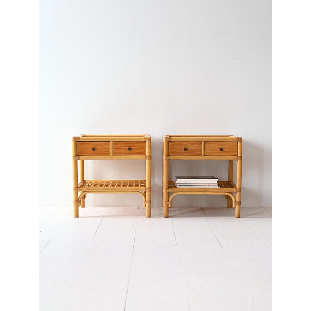 This pair of vintage oriental-style bedside tables combines the elegance of teak with the natural charm of bamboo. Each...