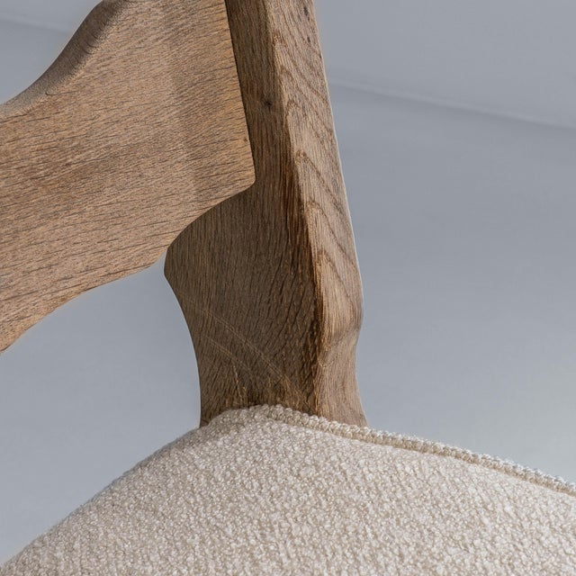 This set of six 1970s French oak dining chairs embodies the enduring appeal of provincial craftsmanship paired with...