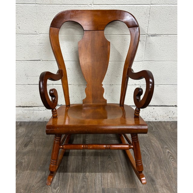 This is a gorgeous vintage Colonial or Queen Anne style solid maple balloon-back rocking chair believed to be Tell City,...