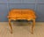 A fine quality late 19th century inlaid satinwood table. Of serpentine form and of excellent construction with stunning...