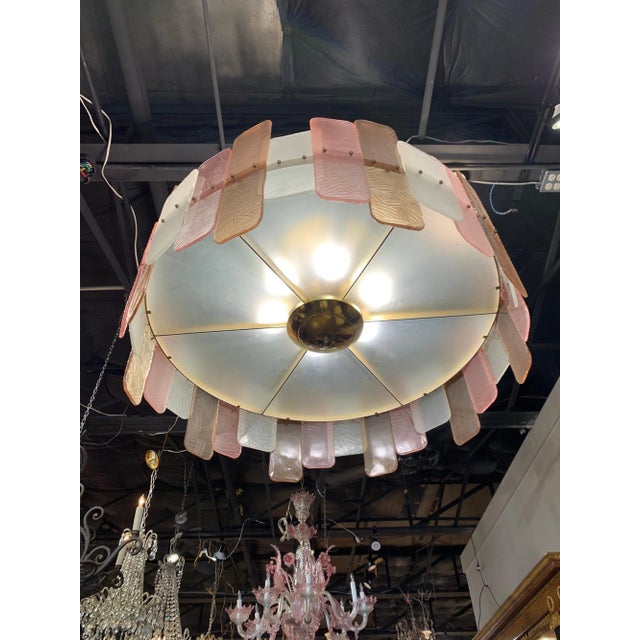 Stunning modern Murano glass multicolored round chandelier. Textural rectangles of glass in the colors of pink, beige and...