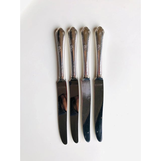 1936 Vintage set of 4 silver plated dinner knives 9.5"L , makers mark reads "Vintage WM A. Rogers A1 Plus Oneida LTD. "...