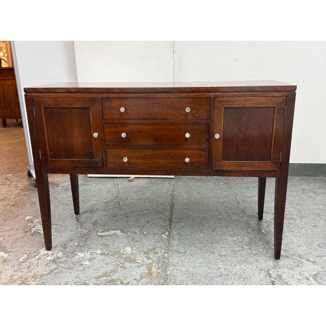 Design Plus Gallery presents a Metropolitan Collection Cherry Wood Sideboard from Stickley. The sideboard has a...