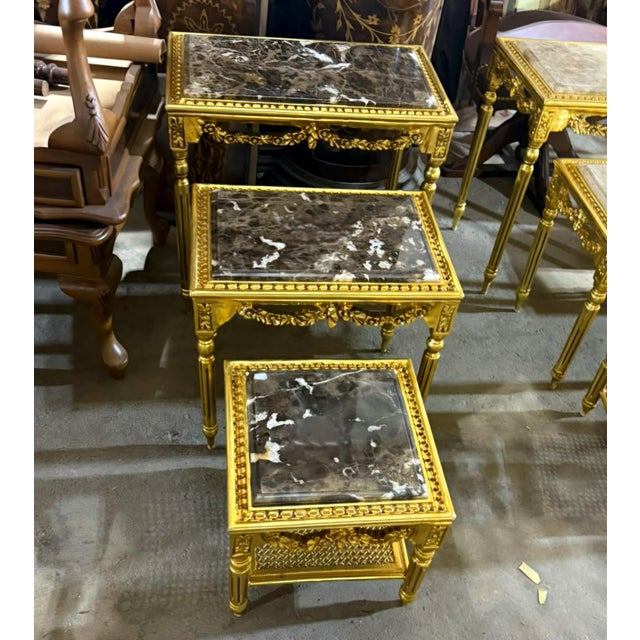 This elegant set of three French style nesting tables combines timeless design with practical functionality. Each table...