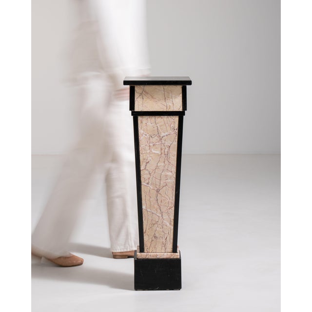 This 1930s Art Deco pedestal from France is finished in antique white, worked in marble. Its design carries the Art Deco...