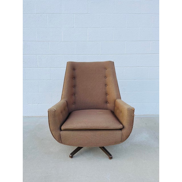 This vintage Castro Convertibles swivel high back lounge chair is a blast from the past and a timeless example of Mid...