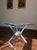 Stunning vintage 1970s Postmodern / Hollywood Regency sculptural side table in the iconic "Butterfly" or "Wing" style...