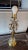 Hollywood Regency brass and crystal cherub lamp with shade and hanging crystals. Total height is 33" with shade, the lamp...