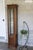 Exceptional Brandt solid cherry diminutive curio cabinet in the Chippendale style, featuring classic fretwork, crown...
