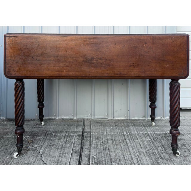 Great antique circa 1820-30 mahogany country Sheraton drop leaf table with single dovetailed drawer. Great rope turned...