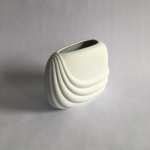 Rosenthal Studio line white porcelain bisque vase by Uta Feyl, circa 1980s. Stunning curved geometric shape. Measurements:...