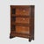 An authentic Lundstrom Arts & Crafts oak 3-stack barrister bookcase, dating to circa 1920. Crafted from solid quarter-sawn...