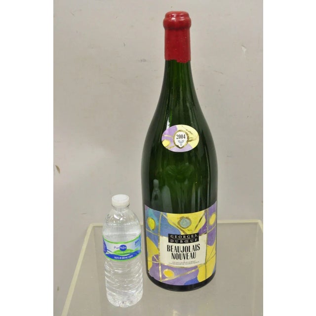 2004 George Duboeuf Beaujolais Nouveau Vintage Display Dummy Wine Champagne Bottle. Circa Late 20th to Early 21st Century....