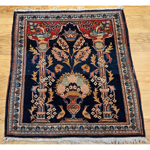 "A unique and exquisitely detailed vintage Persian Kashan pictorial rug, featuring a finely rendered vase pattern with the...