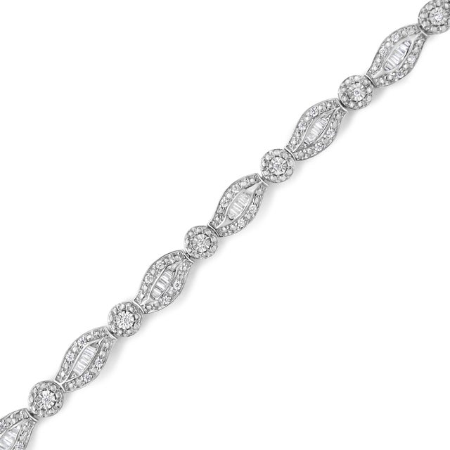 Add a little sparkle to your outfit with this lovely sterling silver link bracelet that features 1 ct TDW of diamonds. A...
