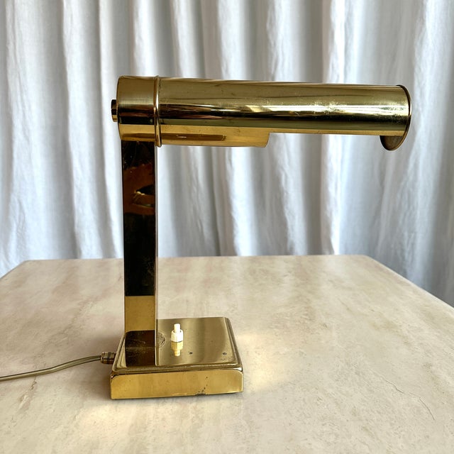 Cute German mid century brass table lamp with adjustable shade, 1960s. Prime example of fine West German product design, a...