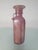 An iridescent pink vase in pink / mauve colored Murano glass attributed to famous glass artist Archimede Seguso Archimede...