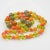 Orange Bakelite and Lucite Necklace Extra Long Shape Orange Green and Glitter Beads For Sale - Image 8 of 12