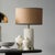 New Item. Not vintage. The round pillar of the Bella Table Lamp is shaped from multiple white marble pieces placed to give...