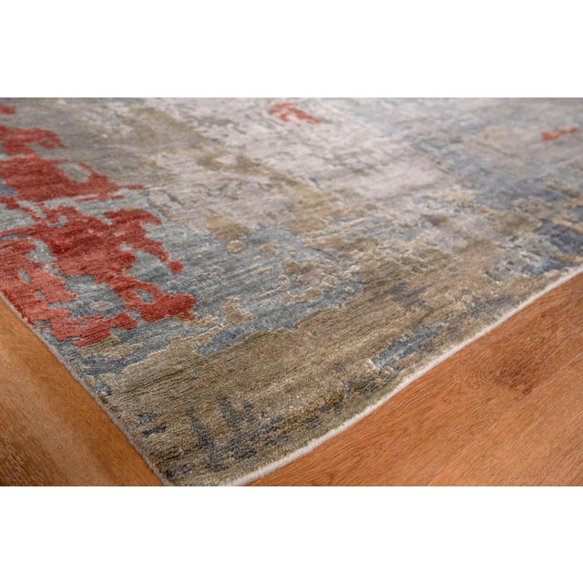Our Laureno rug is hand knotted of Bamboo silk and is the absolute definition of “Art for the Floor.” A borderless...