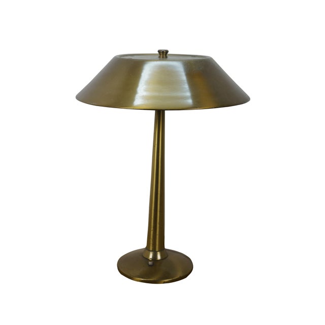 Mid 20th century brushed brass two light table / desk lamp featuring sleek, classic mid century modern styling with round...