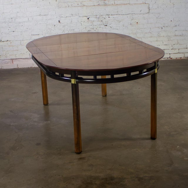 Mid-20th Century MCM to Campaign Style Round to Oval Expanding Dining Table Attributed to Tung Si Collection by Hickory Manufacturing For Sale - Image 9 of 18