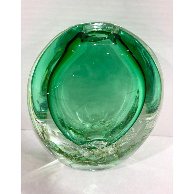 This fantastic vase was created by the furnaces of Seguso in Murano, Italy. Named "Tulle", it features a beautiful green...