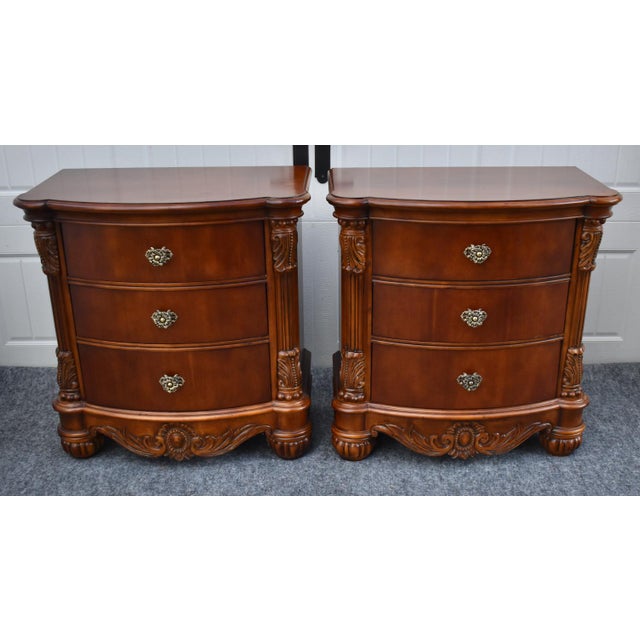 Vintage (1990's) Pair of Nightstands/End Tables made by Pulaski. The Wood is Mahogany. Carved Wood. The Nightstands have...