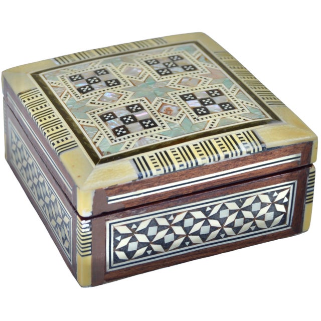 This gorgeous Mid-Century box is thoughtfully handcrafted featuring an intricate hand-carved walnut wood with remarkable...