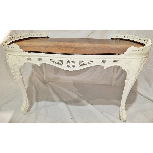 Restored, refinished and rejuvenated, a wonderful Brooklyn made 1920s mahogany rococo coffee table, bookmatched burled...