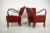 Rare most elegant version of H-237 armchairs designed by Jindrich Halabala in very good original condition. Dark red...