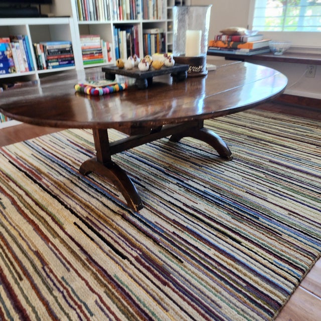 The gorgeous solid walnut oval coffee table was from our family estate collection, custom made in the 1970s. It is...